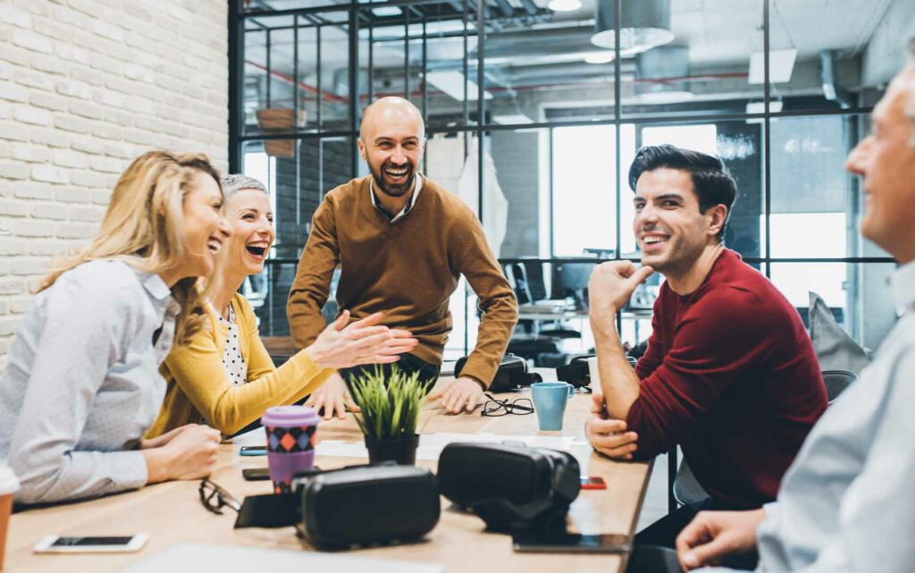 A group of employees in a joyful moment